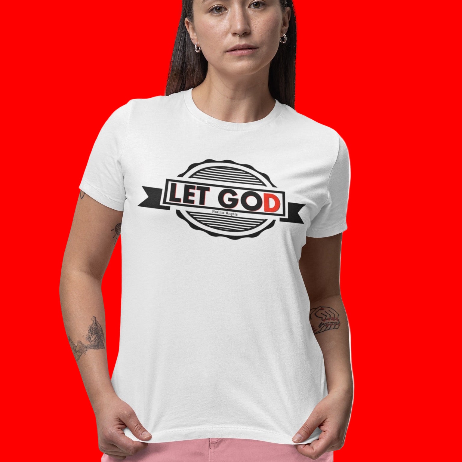 Person wearing a white t-shirt with 'Let Go And Let God' graphic design